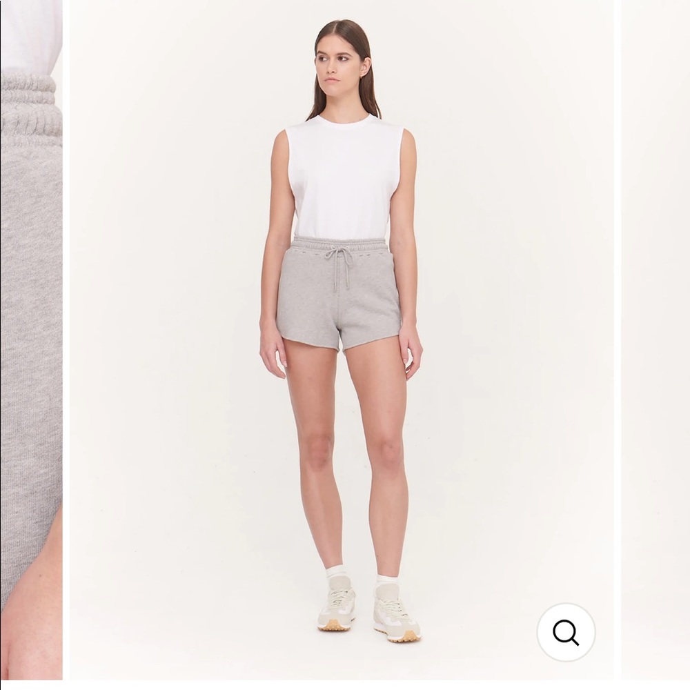 Ninety percent cream colored shorts.*